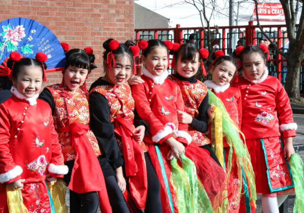 A group of children in traditional Chinese dress