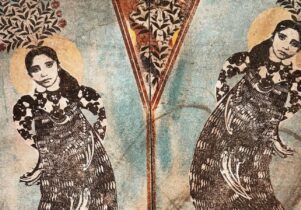 An almost identical mirror image split vertically, showing two women's heads on abstracted bodies, with foliage emerging from their heads, printed on grainy, textured paper in muted blues, reds, yellows and black