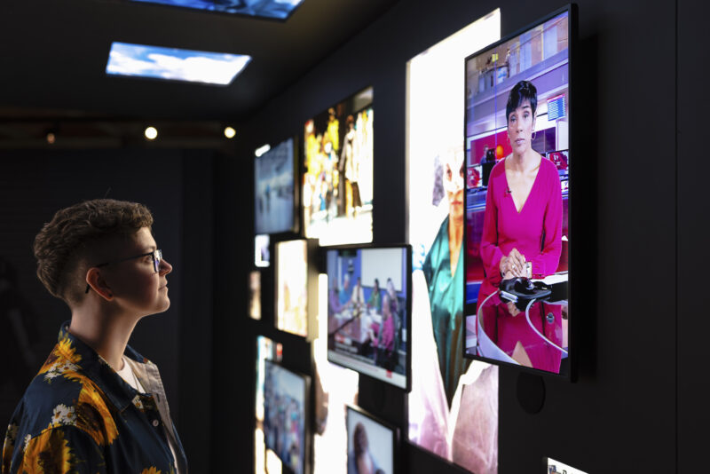 Visitor looking at display in Injecting Hope at Science and Industry Museum