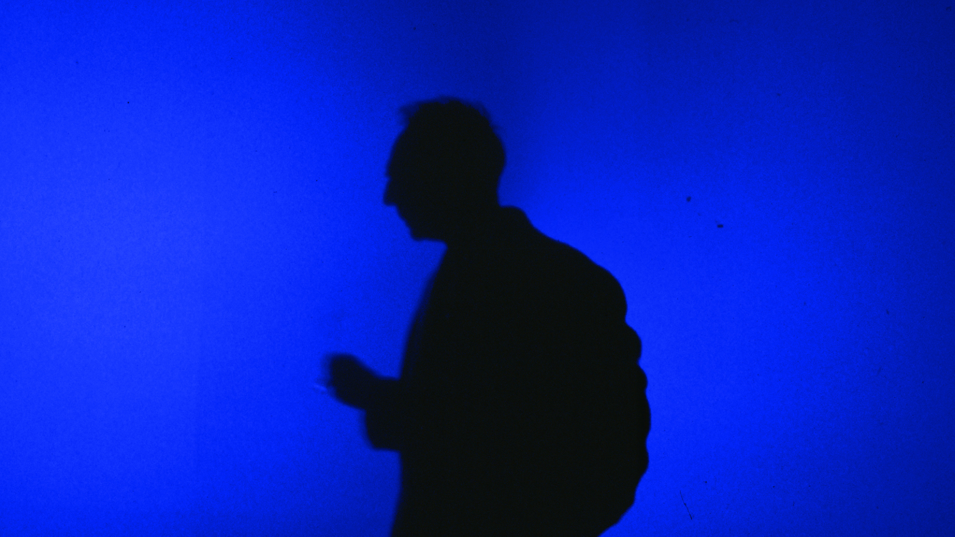 Factory International's Weekend of Film and Music: Silhouette of Derek Jarman against blue background