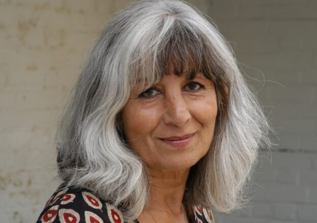 Portrait of Mimi Khalvati with light grey hair 