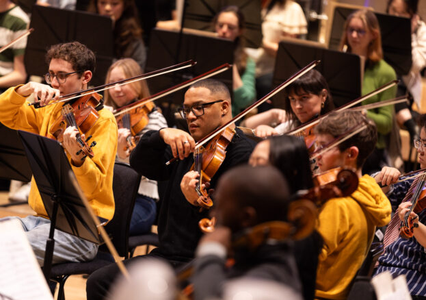 students playing in a symphony