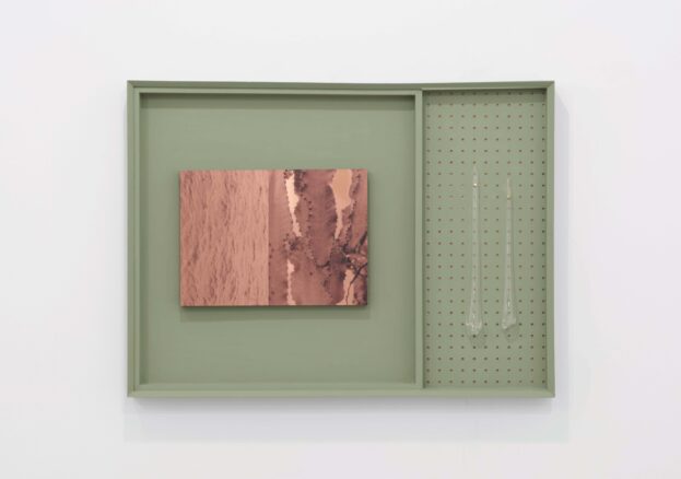 There is Nothing Old under the Sun, Plywood, hand-blown glass, printed copper, emulsion, 69.5 x 51 x 5 cm. A green frame with a printed copper rectangle in the centre. 